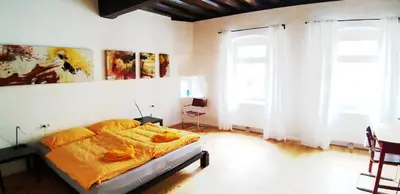 Ein Bett oder Betten in einem Zimmer der Unterkunft Renaissance Apartment Marktplatz