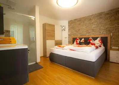 Ein Bett oder Betten in einem Zimmer der Unterkunft Appartement Sonnblick Kuschelsuite in den Bergen