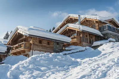 Promi Alm Flachau - Luxus Chalets im Winter