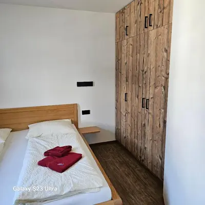 Ein Bett oder Betten in einem Zimmer der Unterkunft Appartementhaus Eisbauer