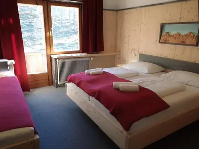 Ein Bett oder Betten in einem Zimmer der Unterkunft Berghotel Türlwand