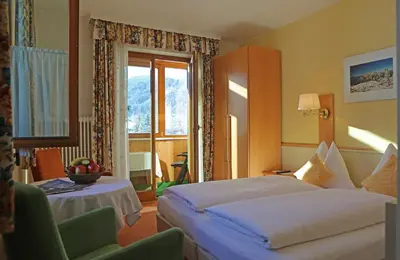 Ein Bett oder Betten in einem Zimmer der Unterkunft Hotel - Restaurant Gosauerhof