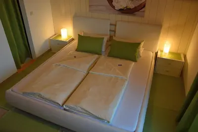 Ein Bett oder Betten in einem Zimmer der Unterkunft Hotel Pension Schwaiger