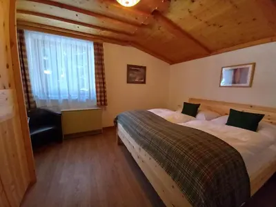 Ein Bett oder Betten in einem Zimmer der Unterkunft Landhaus St. Georg