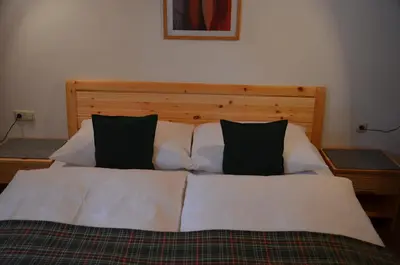 Ein Bett oder Betten in einem Zimmer der Unterkunft Landhaus St. Georg