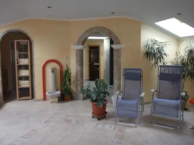Ein Sitzbereich in der Unterkunft Haus Alexander