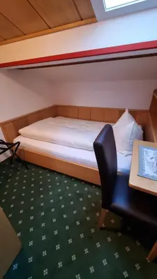 Ein Bett oder Betten in einem Zimmer der Unterkunft Gästehaus Christl