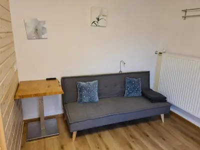Ein Sitzbereich in der Unterkunft Haus Alpenrose