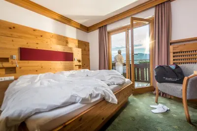 Ein Bett oder Betten in einem Zimmer der Unterkunft Hotel Berghof