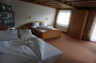 Ein Bett oder Betten in einem Zimmer der Unterkunft Pension Arnika