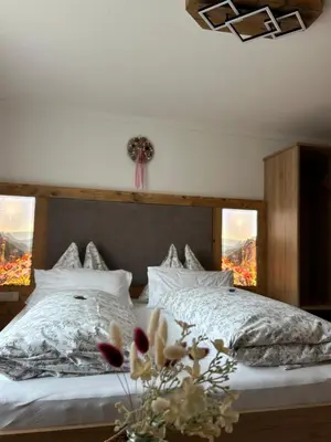 Ein Bett oder Betten in einem Zimmer der Unterkunft Hauslhof