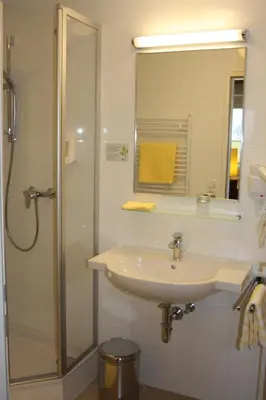 Ein Badezimmer in der Unterkunft Hotel Sonnenhof