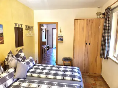 Ein Bett oder Betten in einem Zimmer der Unterkunft Appartement BERGTRÄUME