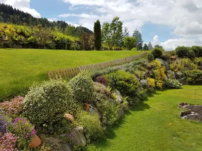 Ein Garten an der Unterkunft Appartement BERGTRÄUME