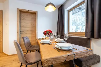 Ein Sitzbereich in der Unterkunft Appartement Angerhaus