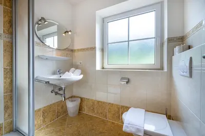 Ein Badezimmer in der Unterkunft Appartement Angerhaus