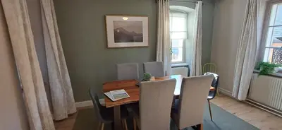 Ein Sitzbereich in der Unterkunft XXL Cosy apartments Villa Goisern, centre with mountain view