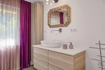 Ein Badezimmer in der Unterkunft Ferienwohnung Kastenmühle im Mondseeland