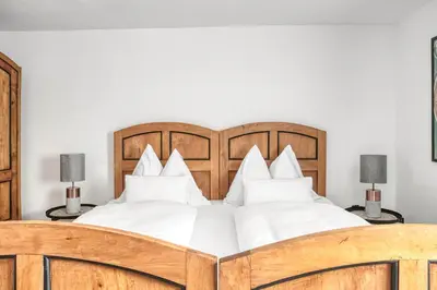 Ein Bett oder Betten in einem Zimmer der Unterkunft Ferienwohnung Kastenmühle im Mondseeland