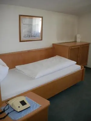 Ein Bett oder Betten in einem Zimmer der Unterkunft Pension Köberl