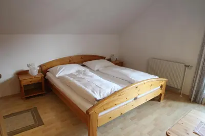 Ein Bett oder Betten in einem Zimmer der Unterkunft Ferienwohnung Syen