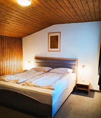 Ein Bett oder Betten in einem Zimmer der Unterkunft Appartements Mooslechner