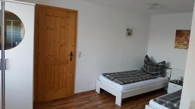 Ein Bett oder Betten in einem Zimmer der Unterkunft ferienhausfindling St.Lambrecht