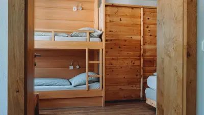 Ein Bett oder Betten in einem Zimmer der Unterkunft Appartement Alpenrauschen