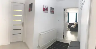 Ein Sitzbereich in der Unterkunft Riverside Ski Apartment