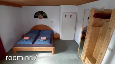 Ein Bett oder Betten in einem Zimmer der Unterkunft Sportpension Schober self check-in