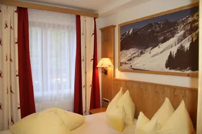 Ein Bett oder Betten in einem Zimmer der Unterkunft Alpen Appartements Zauchensee