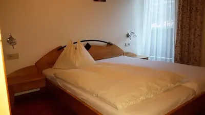 Ein Bett oder Betten in einem Zimmer der Unterkunft Landgasthof Hotel Zehenthof