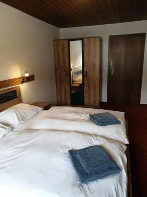 Ein Bett oder Betten in einem Zimmer der Unterkunft Landgasthof Hotel Zehenthof
