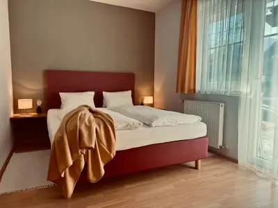 Ein Bett oder Betten in einem Zimmer der Unterkunft Dependance I