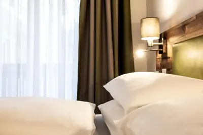Ein Bett oder Betten in einem Zimmer der Unterkunft Der Alpenblick