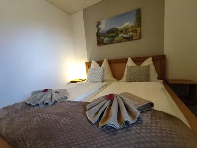 Ein Bett oder Betten in einem Zimmer der Unterkunft Landhaus Seebacher
