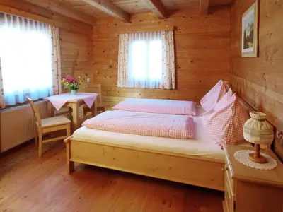 Ein Bett oder Betten in einem Zimmer der Unterkunft Kinderbauernhof Salmanner