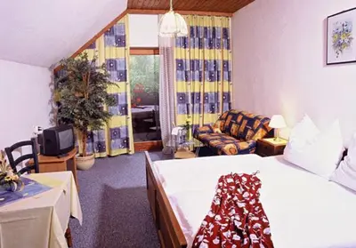 Ein Bett oder Betten in einem Zimmer der Unterkunft Gasthof Steinbräu