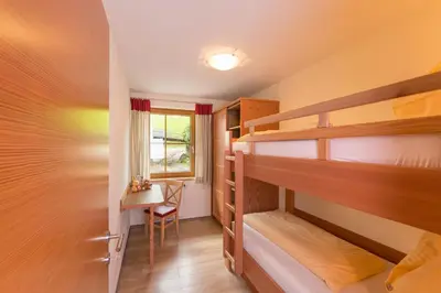 Ein Bett oder Betten in einem Zimmer der Unterkunft Hinteregghof