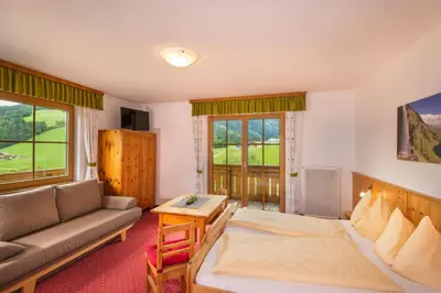 Ein Bett oder Betten in einem Zimmer der Unterkunft Hinteregghof