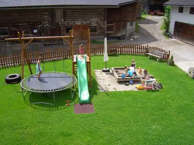 Ein Kinderspielbereich in der Unterkunft Untersteinhof