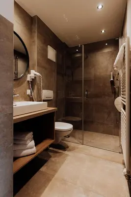 Ein Badezimmer in der Unterkunft FORSTAUERWiRT Hotel & Restaurant