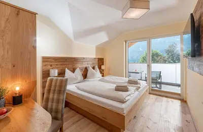 Ein Bett oder Betten in einem Zimmer der Unterkunft Hotel Die Metzgerstubn
