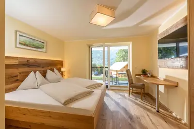 Ein Bett oder Betten in einem Zimmer der Unterkunft Hotel Die Metzgerstubn