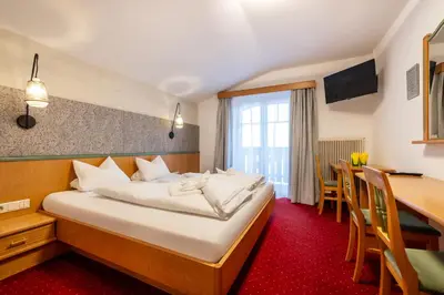 Ein Bett oder Betten in einem Zimmer der Unterkunft Schnitzl-Eck
