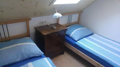 Ein Bett oder Betten in einem Zimmer der Unterkunft Ferienhaus Brunneben Häusl