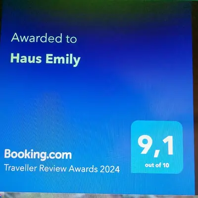 Ein Zertifikat, Auszeichnung, Logo oder anderes Dokument, das in der Unterkunft Haus Emily ausgestellt ist