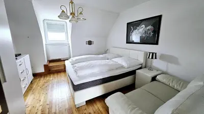 Ein Bett oder Betten in einem Zimmer der Unterkunft Höckner Plaza Hotel