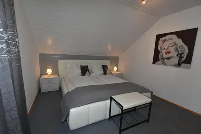 Ein Bett oder Betten in einem Zimmer der Unterkunft Haus Verdi