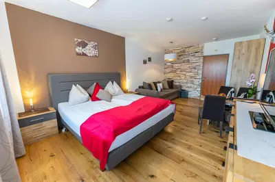 Ein Bett oder Betten in einem Zimmer der Unterkunft Hallstatt Dachstein Inn